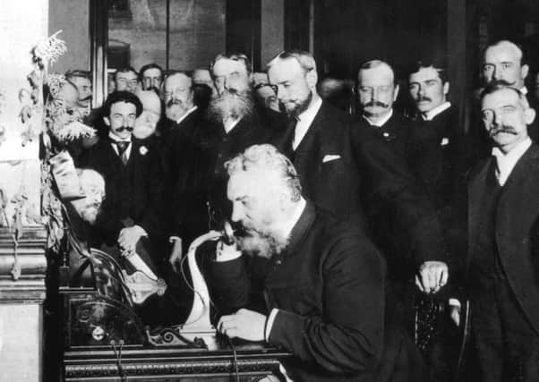 Alexander Graham Bell makes the first telephone call from New York to Chicago in 1892. Picture: Getty Images