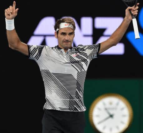 Switzerland's Roger Federer celebrates his win against compatriot Stan Wawrinka in the men's singles semi-final at the Australian Open. Picture: Paul Crock/AFP/Getty Images