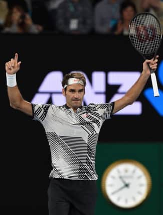 Switzerland's Roger Federer celebrates his win against compatriot Stan Wawrinka in the men's singles semi-final at the Australian Open. Picture: Paul Crock/AFP/Getty Images