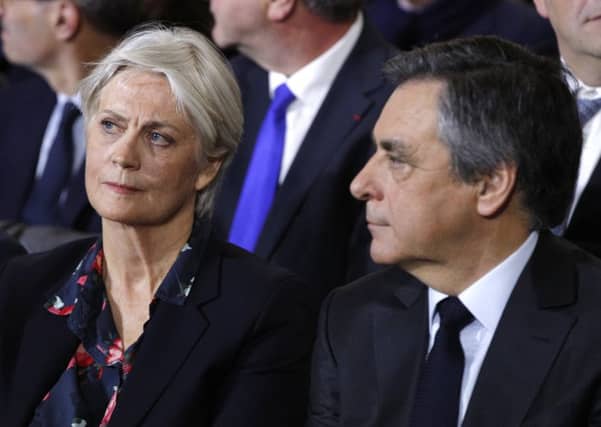 Francois Fillon and his wife Penelope (AP Photo/Christophe Ena)