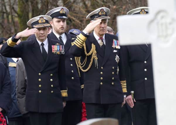 Rear Admiral John Weale, head of the UK submarine service, left, was among senior officers at the Faslane ceremony. Picture: Royal Navy