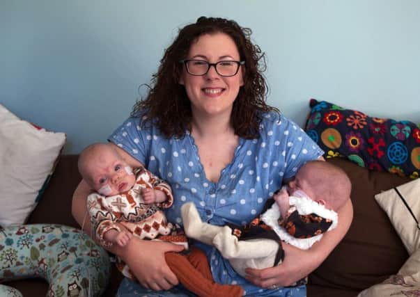 Claire Weir can now look after Imogen and Annabelle at home. Picture: Helen Peck/Saltire News