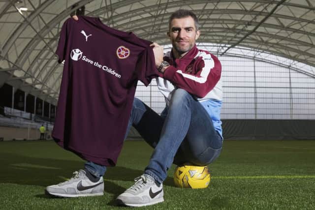 Its why I signed on: Aaron Hughes says he joined Hearts precisely so he could play at places like Parkhead. Picture: SNS