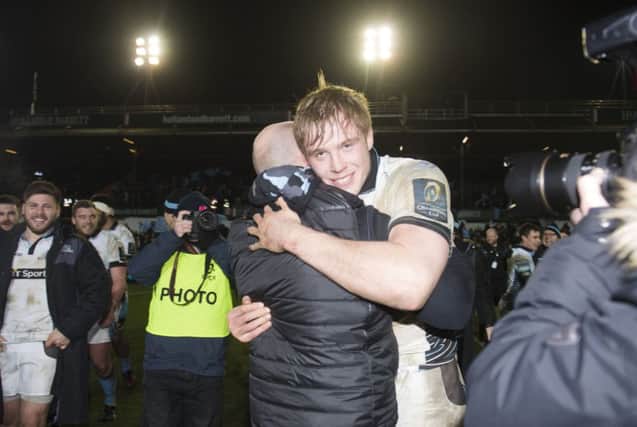 Glasgow co-captain Jonnny Gray embraces coach Gregor Townsend after the famous win at Leicester. Picture: SNS