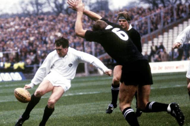 Scotland's Peter Dods clears the ball as Mark Shaw closes in during the 25-25 daw with New Zealand at Murrayfield in 1983. Picture: SNS