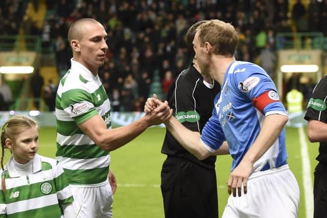 Celtic captain Scott Brown, left, was accused of pushing down Steven Anderson, right, by St Johnstone boss Tommy Wright. Picture: SNS