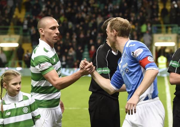 Celtic captain Scott Brown, left, was accused of pushing down Steven Anderson, right, by St Johnstone boss Tommy Wright. Picture: SNS