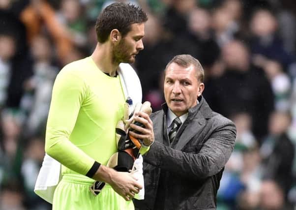 Brendan Rodgers, right, has been impressed with the way Craig Gordon has bought into his style of play. Picture: SNS