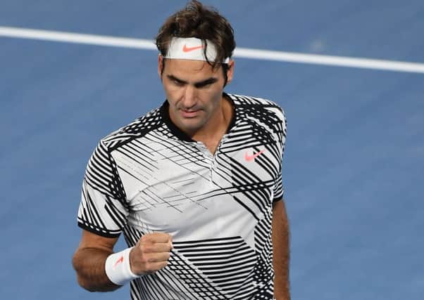 Switzerland's Roger Federer celebrates his win against Switzerland's Stanislas Wawrinka. Picture: Getty Images
