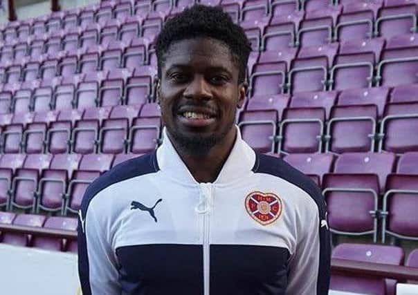 Dylan Bikey poses at Tynecastle after agreeing to join Hearts. Picture: Hearts FC