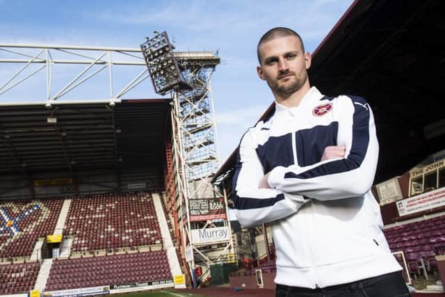 Hearts skipper Perry Kitchen is determined to stop Celtic making history when the teams meet at Celtic Park. Picture: SNS