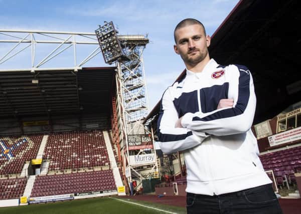 Hearts skipper Perry Kitchen is determined to stop Celtic making history when the teams meet at Celtic Park. Picture: SNS