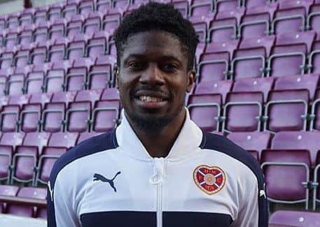 Dylan Bikey poses at Tynecastle after agreeing to join Hearts. Pic: Hearts FC