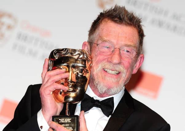 Sir John Hurt with the Oustanding Contribution to Cinema award at the 2012 Orange British Academy Film Awards. Picture: PA