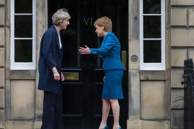 Theresa May could go head to head with Nicola Sturgeon on a second referendum. Picture: Stephen Scott Taylor