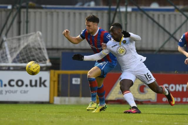 Partick Thistle's Ade Azeez battles with Inverness' Brad McKay during a drab goalless draw. Picture: SNS/Paul Devlin