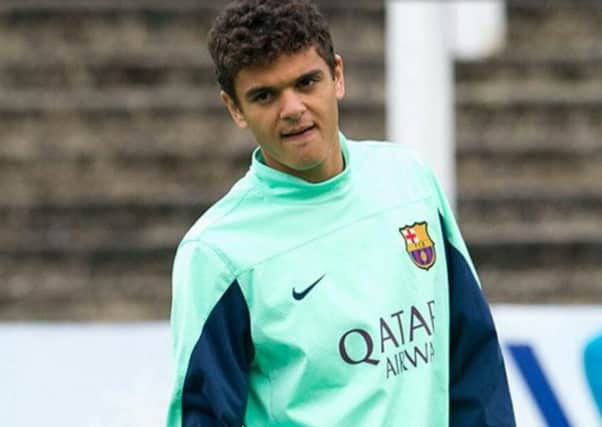 Hearts have signed the former Barcelona winger Moha El Ouriachi Choulay on loan.
