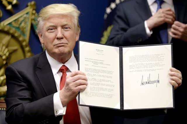 Donald Trump signed an executive order aimed at clamping down on immigration. Picture: Getty Images