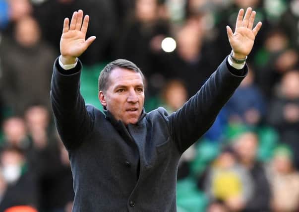 Celtic manager Brendan Rodgers applauds the supporters at full time after his side defeated Hearts. Picture: Alan Harvey/SNS