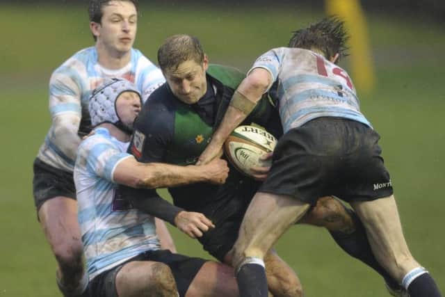 Boroughmuirs Alex Cox tries to force his way past Martin McGinley and Matt Coupar. Picture: Neil Hanna.