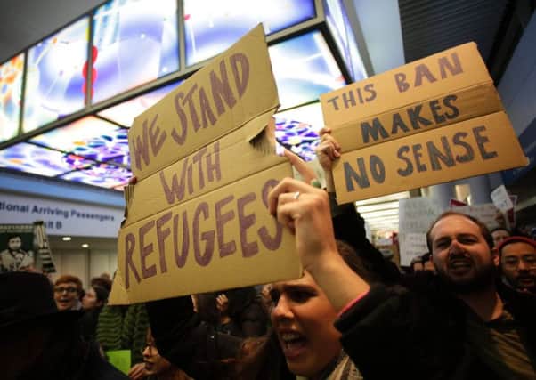 Demonstrators protest against President Trump's immigration ban at Chicago O'Hare International Airport. Picture: AFP/Getty Images
