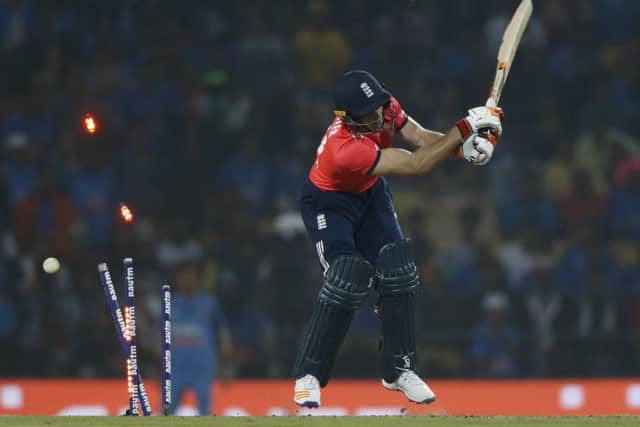 England's Jos Buttler is bowled by India's Jasprit Bumrah in the final over of the second Twenty20 international in Nagpur. Picture: AP Photo/Rajanish Kakade