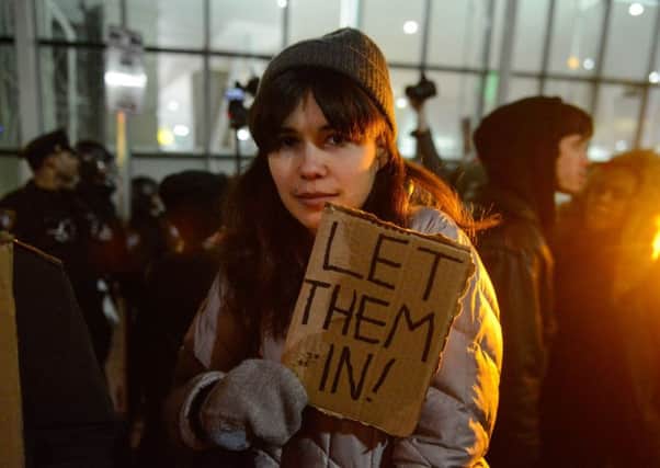 Protestors rally during a demonstration at John F. Kennedy Airport against the new immigration ban issued by President Donald Trump. Picture: Stephanie Keith/Getty Images