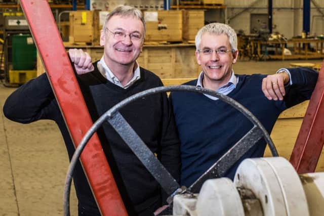 Frontrow chairman Graeme Coutts, left, with Business Growth Fund investor Mike Sibson. Picture: Simon Price