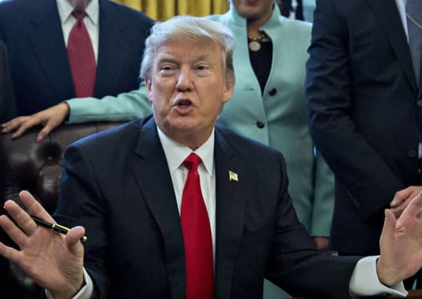 President Donald Trump has fired America's top law enforcement official amid a row over his new travel ban. Picture: Andrew Harrer - Pool/Getty Images