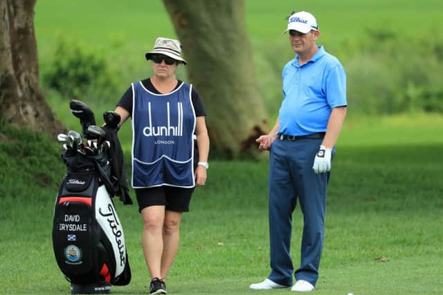 David Drysdale has had his wife Vicky caddying for him. Picture: Richard Heathcote/Getty Images