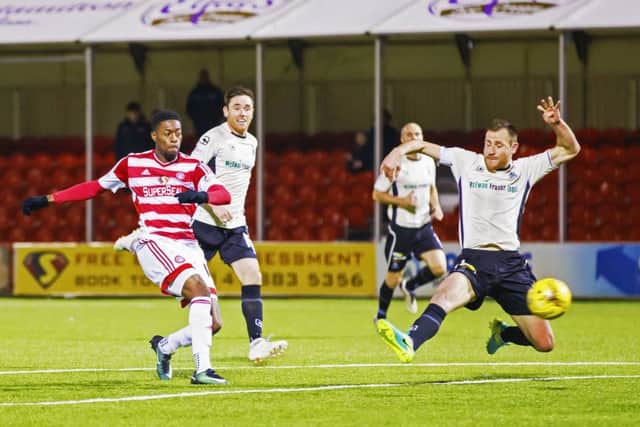 Rakish Bingham completes Caley Thistles misery by scoring Hamiltons third goal. Picture: SNS.