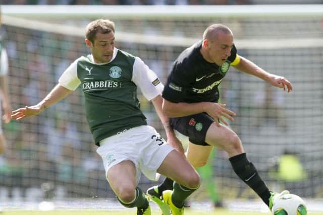 I loved playing against him says Kevin Thomson, left  challenging Scott Brown in the 2013 Scottish Cup final. Picture: SNS.