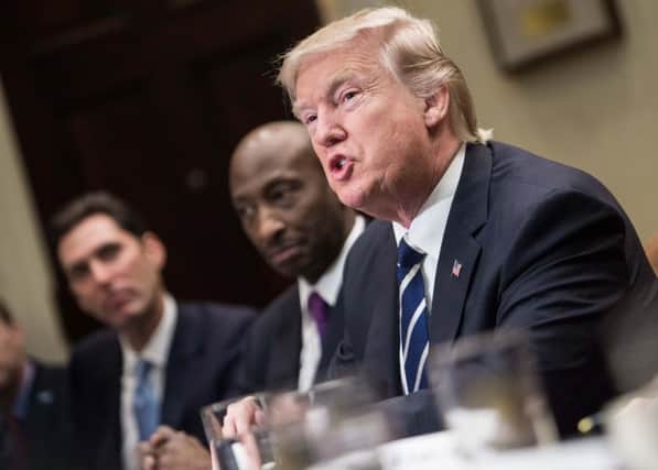 Trump drew his strongest criticism yet from a government minister when Home Secretary Amber Rudd questioned the effectiveness of his travel ban. Picture: AFP/Getty Image