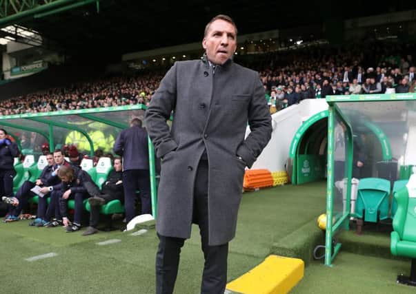 Brendan Rodgers and Celtic held on to their star players. Picture: PA
