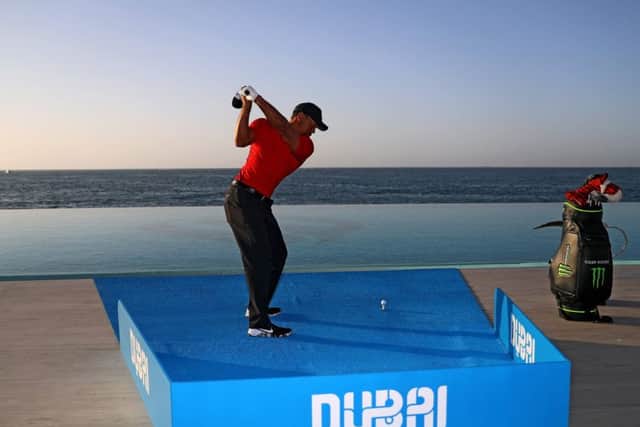 Tiger Woods plays a shot into the Gulf from a hotel ahead of the Omega Dubai Desert Classic at Emirates Golf Club in Dubai, United Arab Emirates.  Picture: Warren Little/Getty