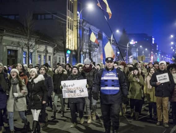 Picture: Andrei Dascalescu. Protesters take to the streets in Cluj-Napoca, Romania.