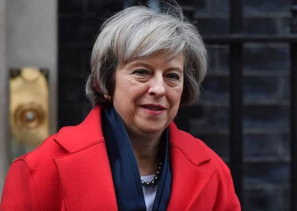 Theresa May agreed that what a woman wears is a womans choice. Picture: AFP/Getty Images