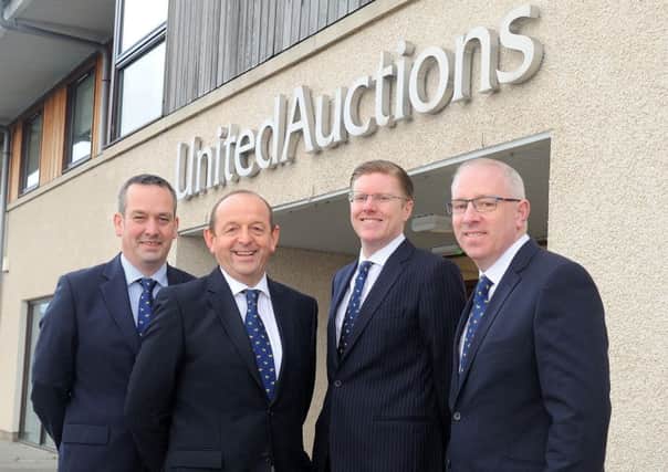 United Auctions' new owners, from left: John Roberts, George Purves, Christopher Sharp and Donald Young. Picture: Whyler Photos