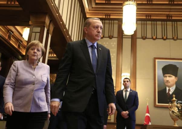 Chancellor Angela Merkel and president Recep Tayyip Erdogan. Picture: AP