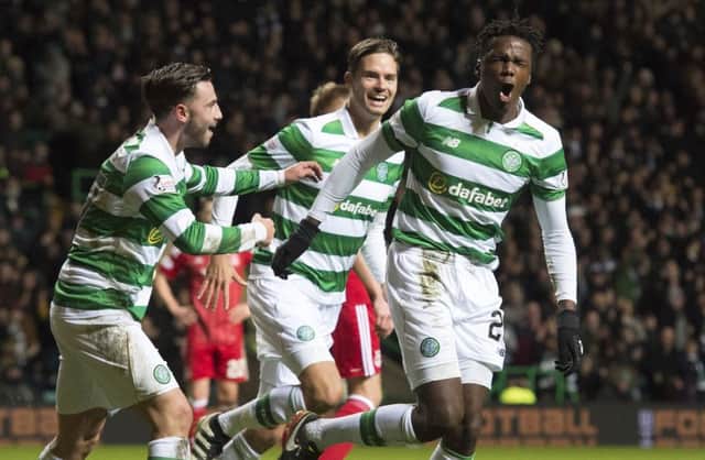 Celtic's Dedryck Boyata (right) celebrates his goal. Picture: SNS