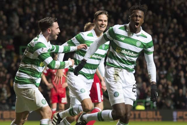 Celtic's Dedryck Boyata (right) celebrates his goal. Picture: SNS