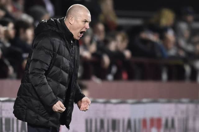 Rangers manager Mark Warburton roars encouragement during his side's 4-1 defeat at Tynecastle. Picture: SNS