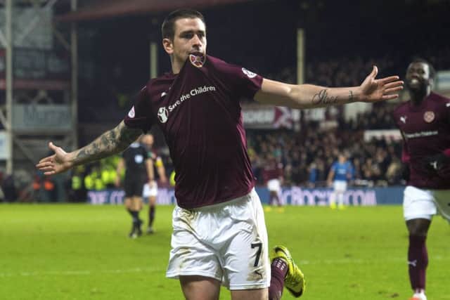 Hearts' Jamie Walker celebrates the first of his two goals in the 4-1 win over Rangers. Picture: Craig Foy/SNS