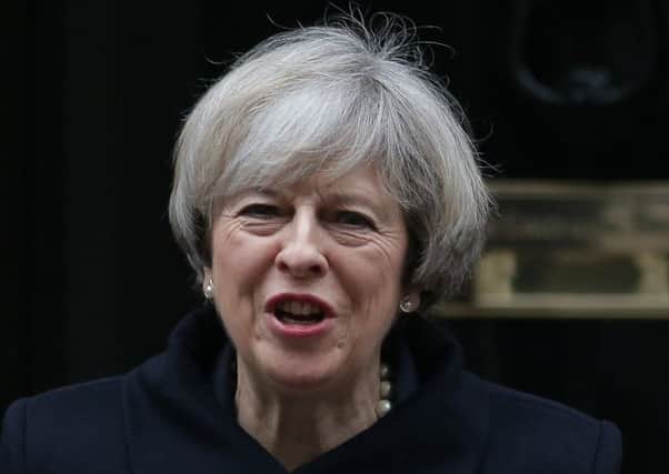 Theresa May was urged to support fresh sanctions against Iran, but instead gave her backing to an existing deal. Picture: AFP/Daniel Leal Olivas