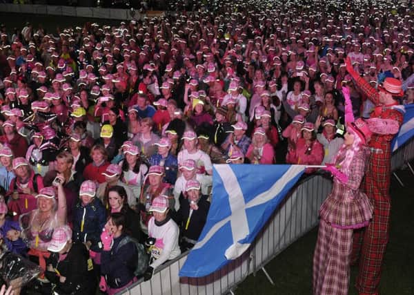 Thousands of walkers wearing pink bras took part in last years MoonWalk. Picture: Neil Hanna