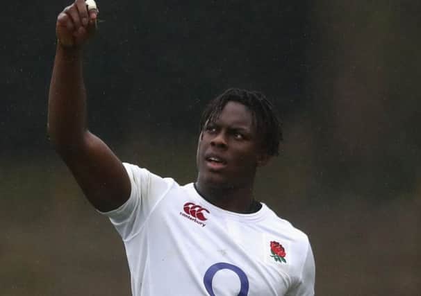 Maro Itoje tests the strength of the wind during the England training session. Picture: David Rogers/Getty Images