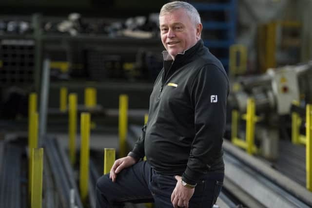 Pictured at the Empteezy factory in Livingston, Bruce Wishart founded the business in 1986 after coming up with a new way to easily empty waste into skips. Picture Ian Rutherford