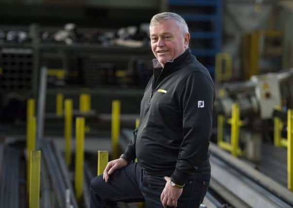 Pictured at the Empteezy factory in Livingston, Bruce Wishart founded the business in 1986 after coming up with a new way to easily empty waste into skips. Picture Ian Rutherford