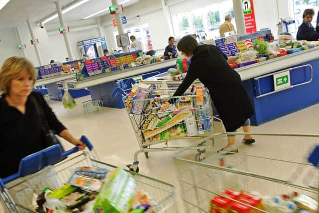 After several years of retreat, food retailing's Big Four are mounting a fightback, writes Martin Flanagan. Picture: Adrian Dennis/AFP/Getty Images