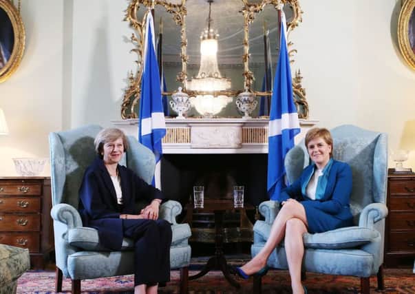 Prime Minister Theresa May (left) meets with Scotland's First Minister Nicola Sturgeon at Bute House in Edinburgh.